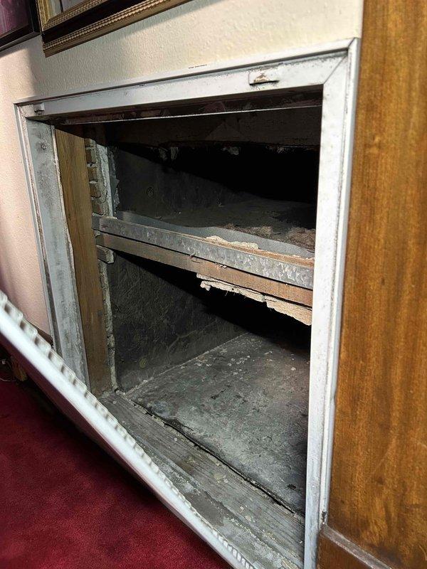 Responded to commercial no-heat call where thermostat was blank and system non-operational. Upon inspection, found deteriorating insulation in ductwork and evidence of age-related wear in an access compartment. Performed necessary repairs to restore system functionality.