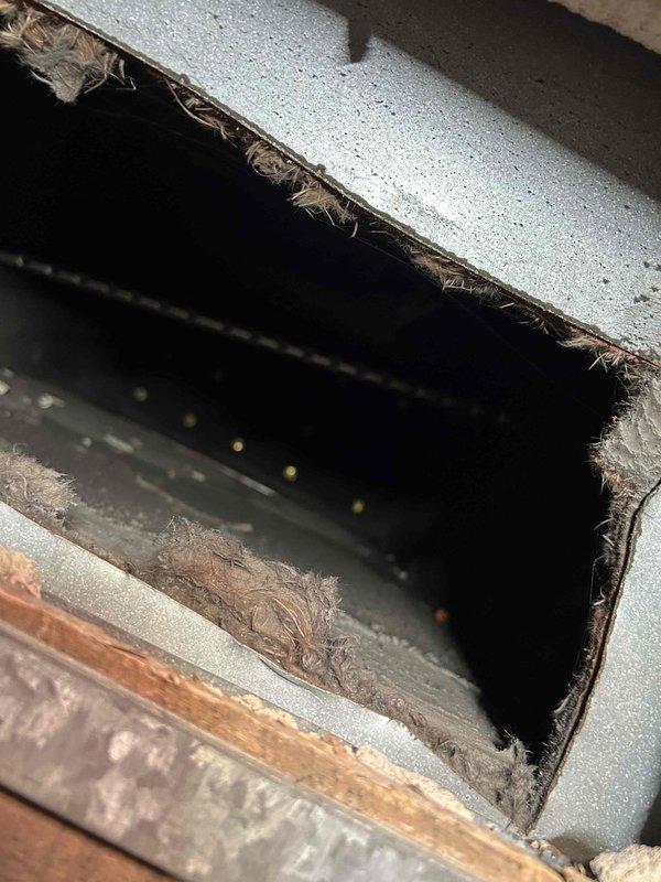 Responded to commercial no-heat call where thermostat was blank and system non-operational. Upon inspection, found deteriorating insulation in ductwork and evidence of age-related wear in an access compartment. Performed necessary repairs to restore system functionality.