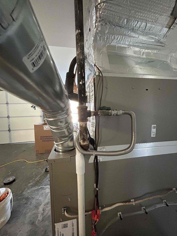 Successfully installed a complete Bryant HVAC system consisting of an 80% efficient 70K BTU gas furnace (800SB36070M14), 2-ton 14.3 SEER2 air conditioning unit (GA5SAN52400W), and matching 2-ton evaporator coil (CVAVA2414XMA). Installation included all required connections, safety components, and verification of proper system operation while utilizing the existing thermostat.
