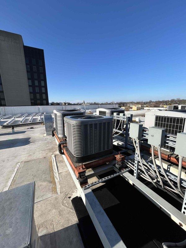Completed installation of a RUUD 14.3 SEER2 two-stage 2-ton heat pump system, including RH2TY2417STANNJ air handler and RXBH-1724A10J-B 10KW heat kit. System was properly leveled, connected to existing ductwork, and includes a Honeywell digital WiFi programmable thermostat, SS2 coil drain safety water sensor, and overflow drain pan with water sensor. Outdoor unit #427 was properly labeled and mounted on existing pad with snow legs.