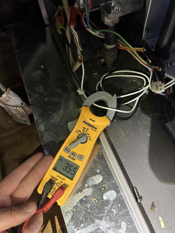 Performed scheduled Care Plan Tune Up on two air conditioners and two gas furnaces. Conducted electrical testing with Fieldpiece clamp meter, measuring amperage readings of 35.5A on system components. Inspected blower wheel assembly, confirming proper condition with no visible damage or debris accumulation.
