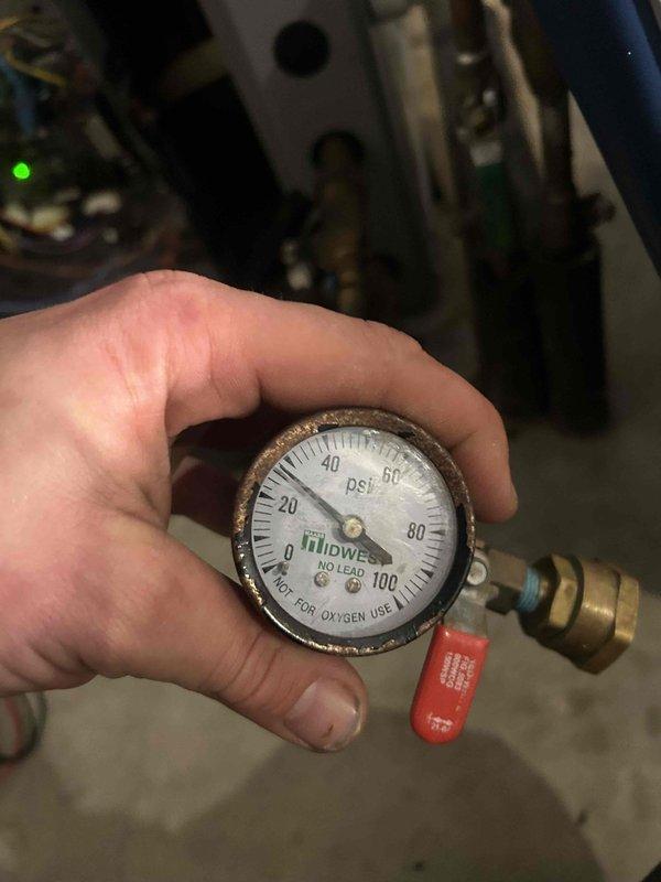 Successfully replaced a 2-pump flow center in the geothermal system, which included performing a complete flush and fill procedure. System pressure was verified using pressure gauge testing, and all new components were properly installed and insulated on the concrete wall mounting.