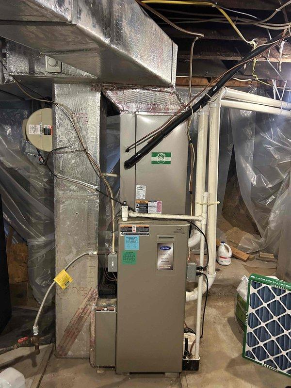 Performed scheduled Care Plan Tune Up service on customer's HVAC system, including inspection and maintenance of AC unit, gas furnace, and humidifier system. Verified proper operation of the Carrier Infinity System thermostat and heating mode functionality. Customer provided their own filter as noted, and humidifier pad replacement was not covered under the current maintenance plan.