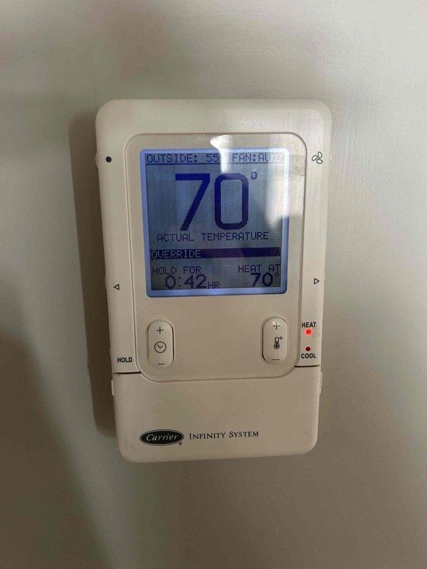 Performed scheduled Care Plan Tune Up service on customer's HVAC system, including inspection and maintenance of AC unit, gas furnace, and humidifier system. Verified proper operation of the Carrier Infinity System thermostat and heating mode functionality. Customer provided their own filter as noted, and humidifier pad replacement was not covered under the current maintenance plan.