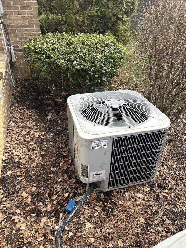 Responded to a no-heat service call for a Payne heat pump system with Carrier air handler. Diagnosed electrical failure at outdoor unit preventing compressor operation. Replaced failed capacitor and contactor, restored power flow, and verified proper operation in heating mode. System now functioning properly with normal temperature differential across coils.