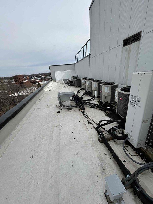 Responded to commercial property for no heat complaint on a rooftop HVAC system over 10 years old. Upon inspection of multiple rooftop units, identified blown line set on unit 601 and similar issues affecting adjacent equipment. Replaced damaged refrigerant lines, pressure tested system, evacuated to proper vacuum, and recharged with correct refrigerant to restore heating function.
