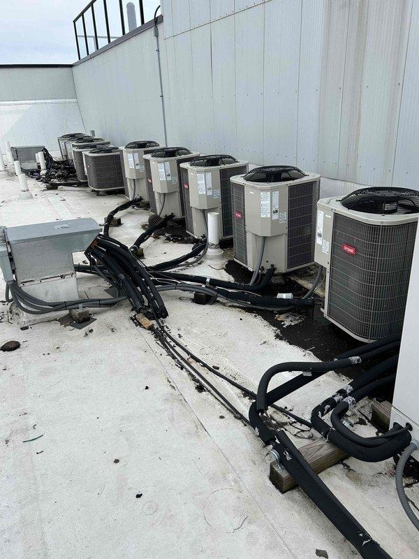 Responded to commercial property for no heat complaint on a rooftop HVAC system over 10 years old. Upon inspection of multiple rooftop units, identified blown line set on unit 601 and similar issues affecting adjacent equipment. Replaced damaged refrigerant lines, pressure tested system, evacuated to proper vacuum, and recharged with correct refrigerant to restore heating function.