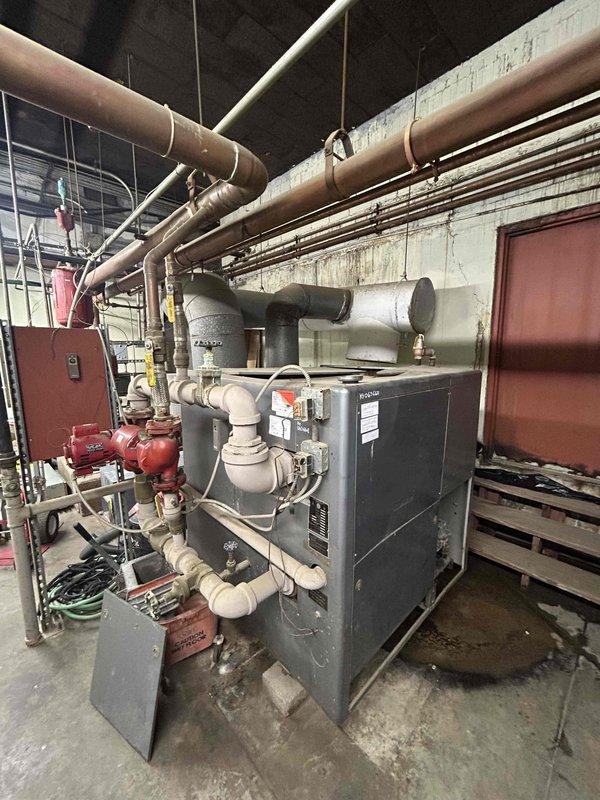Responded to water leak service call for commercial boiler system. Upon inspection, identified leaking circulation pump within complex hydronic network. Replaced faulty pump seals and verified proper operation of the system with no further leakage detected.