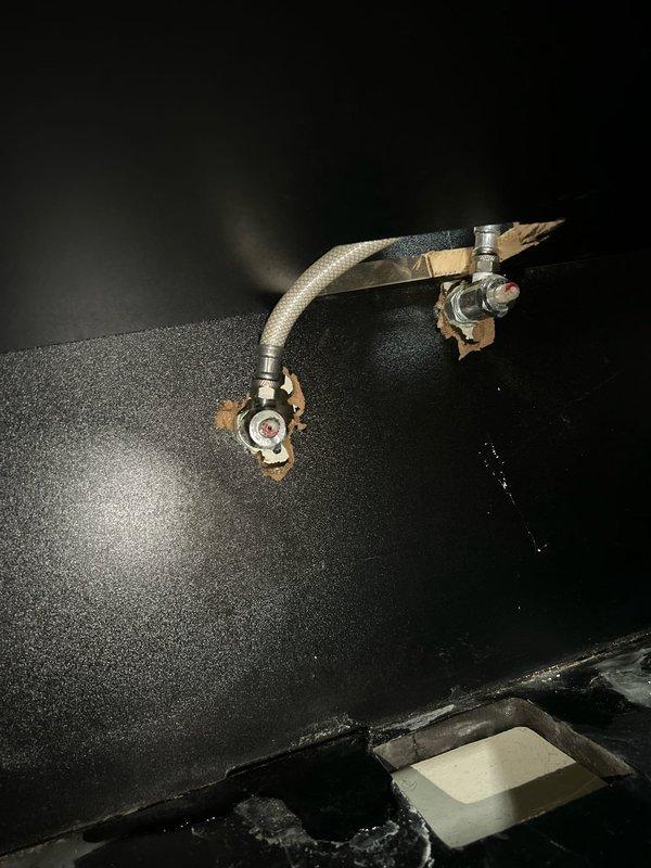 Conducted initial assessment for new client regarding multiple plumbing issues. Identified leaking kitchen sink with high-end pull-down faucet and damaged supply line connection with visible tears in surrounding wall material. Also evaluated bathroom shower/tub leak. Provided comprehensive estimates for all necessary repairs.