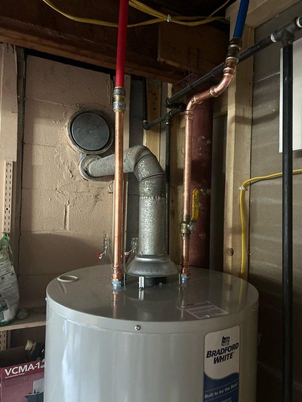 Successfully installed new 50-gallon Bradford White gas water heater in garage as scheduled. Completed all necessary connections including copper/PEX supply lines, gas line with proper fittings, and ventilation system. System tested and functioning properly with no leaks detected.