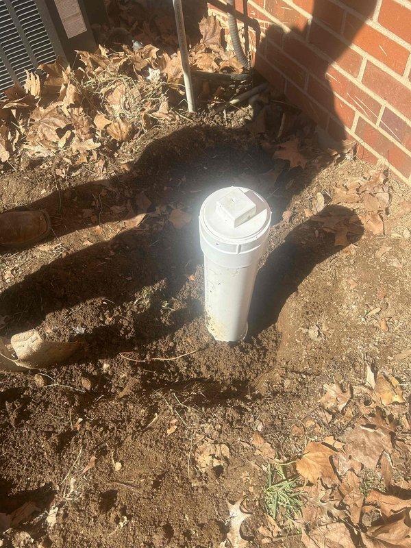 Excavated approximately 2-3 feet to expose sewer line and installed new cleanout at exterior foundation wall. Capped existing sewer line in crawlspace where female threads were intact. Job included hazardous materials handling due to standing sewage in crawlspace.
