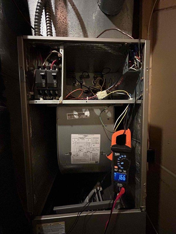 Performed biannual Care Plan maintenance on dual heat pump and air handler system located in attic and basement. Conducted comprehensive electrical diagnostics using clamp meter, measuring amperage draw (156A) and voltage (-18.43V) at the control panel. All components functioning within specifications; customer provides their own filters.
