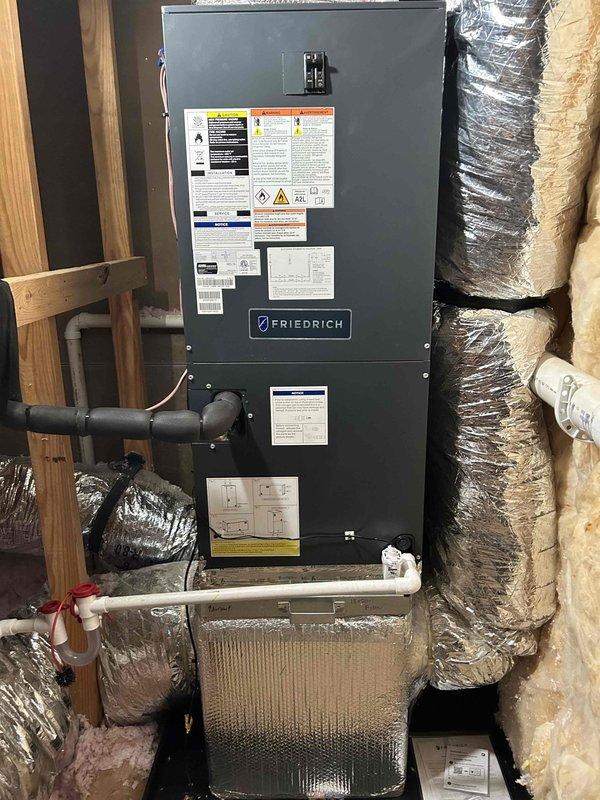 Successfully installed a complete Friedrich Breeze HVAC system, including a 2-ton Side Discharge 18 SEER2 heat pump, matching air handler with 10KW auxiliary heat kit, and Honeywell TH6320U2008/U thermostat. System installation included all necessary components: outdoor unit pad, snow legs, electrical connections, refrigerant line insulation/filter, drain trap, SS2 coil drain safety water sensor, and transition to existing ductwork.