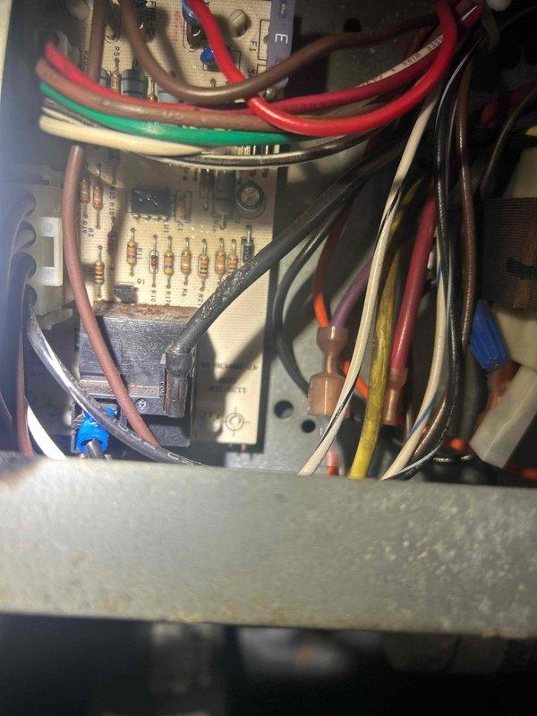 Completed scheduled preventative maintenance on air conditioning system. Inspected and documented internal electrical components, including circuit board, wire connections, and control panel. All components found to be in working order with no visible issues detected.