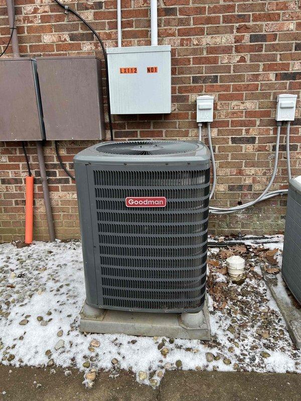 Performed scheduled care plan tune-up on Goodman heat pump system. Inspected outdoor unit and found capacitor showing signs of corrosion; replaced capacitor and reconnected wiring properly. System now operating within normal parameters.