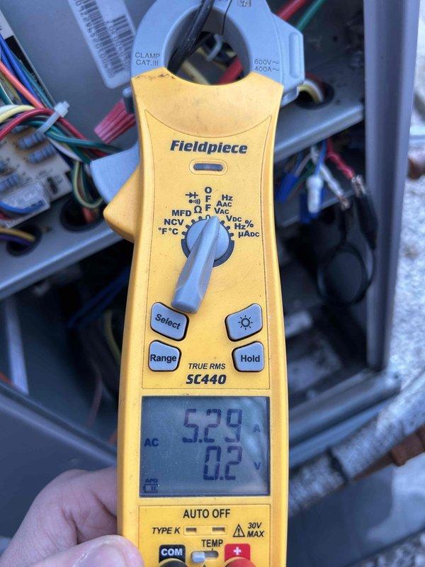 Performed scheduled Care Plan Tune Up on gas package unit including inspection of electrical components with voltage readings (5.29V AC) using Fieldpiece SC440 meter. Examined burner assembly showing normal oxidation with proper flame pattern and verified gas manifold integrity. Customer-supplied bag filter and pre-filter were installed and system was returned to proper operating condition.