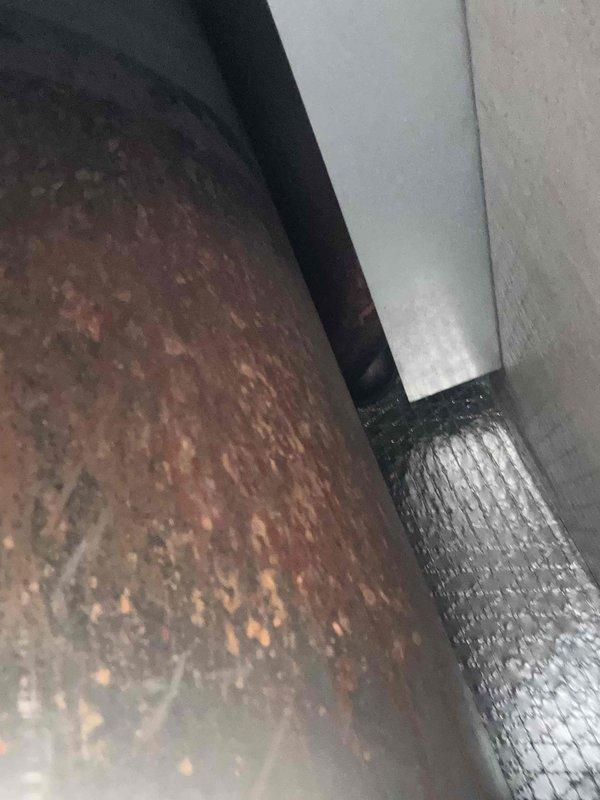 Performed scheduled Care Plan Tune Up on two AC units connected to oil furnaces, including replacement of nozzles (.85 80°B) and oil filters (General 2A-710). Upon inspection, identified significant corrosion on metal components and investigated noise concern reported by customer. Materials were on-site as pre-arranged. Note: Service was limited to the two AC systems directly connected to oil furnaces as specified in maintenance agreement.