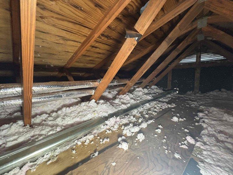 Successfully installed a Navien 199k BTU tankless water heater with recirculation system after removing the existing water tank. Ran PVC venting through the roof and verified proper installation of all components in the attic space, ensuring proper insulation clearance around venting. System includes 15-year heat exchanger warranty, 5-year parts warranty, and 1-year labor warranty.