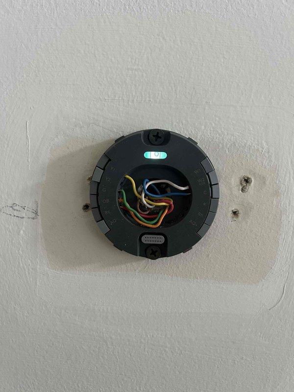 Responded to a no-heat call for a system less than one year old. Diagnosed thermostat wiring issue causing improper communication between the thermostat and furnace. Rewired connections, verified proper operation with the digital display now showing correct temperature readings (66°F current, 71°F set point), and confirmed system is now heating properly.