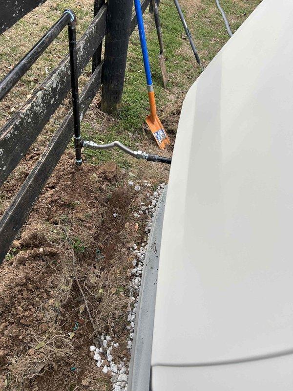 Completed installation of a 24KW generator system with 16-circuit automatic transfer switch. Work included excavation for proper placement of the generator unit adjacent to the building structure, installation of required gas piping along the exterior wall, and connection to the home's electrical system. All connections were properly secured and tested to ensure full functionality during power outages.