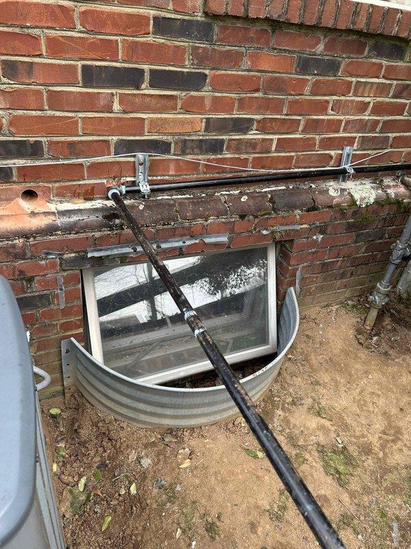 Completed installation of a 24KW generator system with 16-circuit automatic transfer switch. Work included excavation for proper placement of the generator unit adjacent to the building structure, installation of required gas piping along the exterior wall, and connection to the home's electrical system. All connections were properly secured and tested to ensure full functionality during power outages.