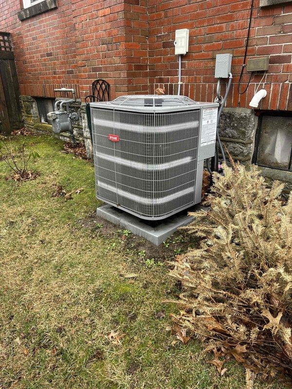 Performed annual care plan tune-up on Bryant heat pump system with air handler located in attic. Conducted electrical testing with multimeter showing 2.1 amp draw on the outdoor unit, which is within normal operating parameters. Inspected and confirmed proper installation of the 20x20x1 air filter and documented boiler equipment information from basement unit.