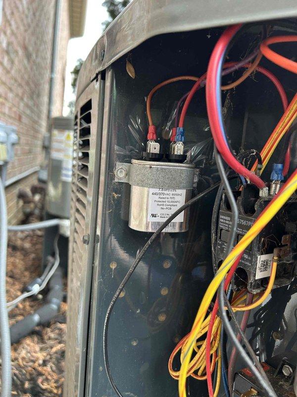 Completed replacement of capacitors on System 1-2 as documented with installation photos, showing proper wiring connections to the TITAN PRO TRCFD70S capacitor. Additionally, replaced UV bulbs in Systems 1-2 and 4, installed warranty-approved Lennox replacement heat kit for System 3, and replaced thermostat on System 5, resolving all identified issues across multiple HVAC systems.