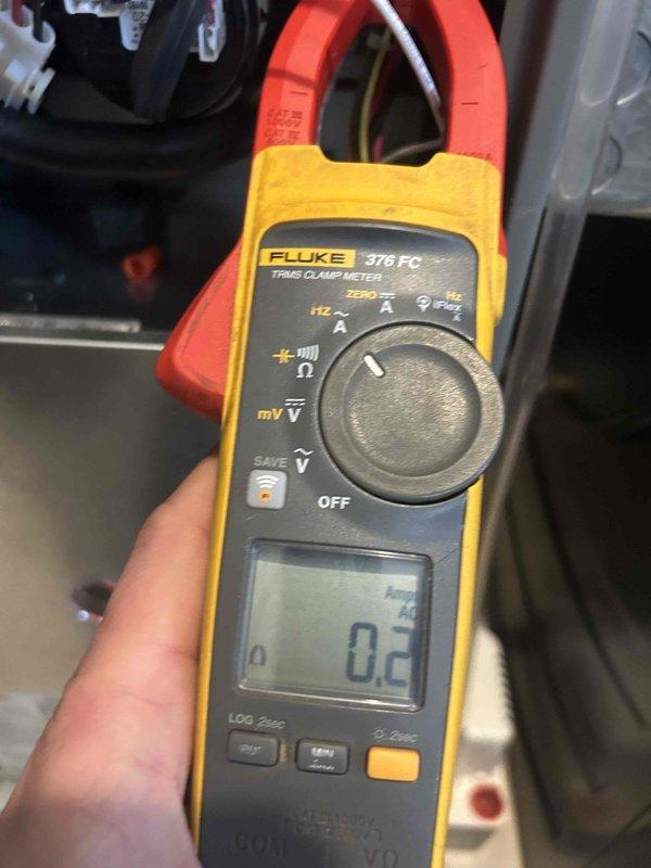 Performed scheduled maintenance on AC/GF system located in laundry room. Conducted electrical testing using Fluke 376 FC clamp meter, confirming proper voltage readings of 0.2. Inspected Aprilaire 1410 filter rack and advised customer regarding filter replacement options.