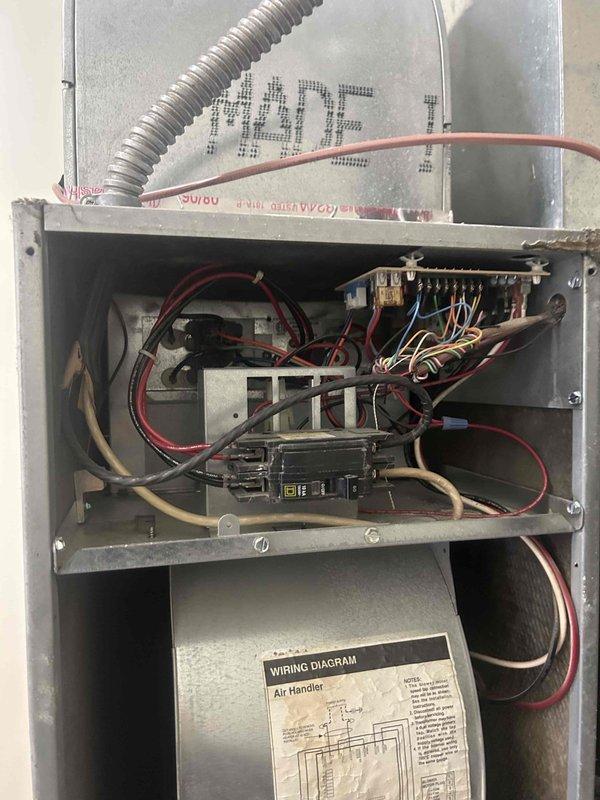 Responded to no-heat call for 15-year-old heat pump system with rooftop air handler. Upon inspection of the RTU, discovered failed compressor as previously diagnosed. Examined electrical control panel components and inspected refrigerant lines and electrical conduits for proper installation. Replaced compressor and restored system operation to manufacturer specifications.