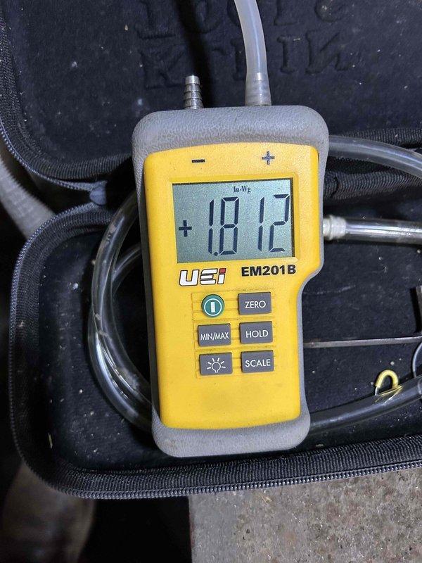 Completed heat exchanger replacement on commercial unit as scheduled. Conducted pressure testing with UEi EM201B manometer showing initial reading of 1812 InWg, with final measurement of 35.14 InWg post-installation, confirming proper system operation and pressure differential within manufacturer specifications.