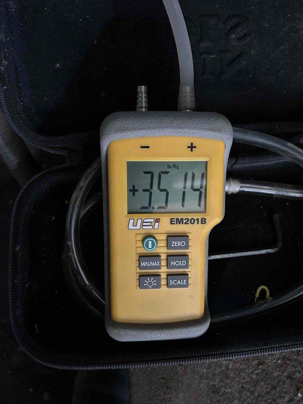 Completed heat exchanger replacement on commercial unit as scheduled. Conducted pressure testing with UEi EM201B manometer showing initial reading of 1812 InWg, with final measurement of 35.14 InWg post-installation, confirming proper system operation and pressure differential within manufacturer specifications.