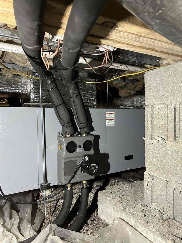 Successfully installed a WaterFurnace 3-ton 5 Series (30 EER 5 COP) Two Stage Horizontal Geothermal system with 10KW heat kit in residential property. Installation included new flow center, hose kit, 4" media filter cabinet, and condensate pump, while integrating with existing zone control and thermostats. All ductwork was properly sealed and insulated with reflective material for maximum efficiency.