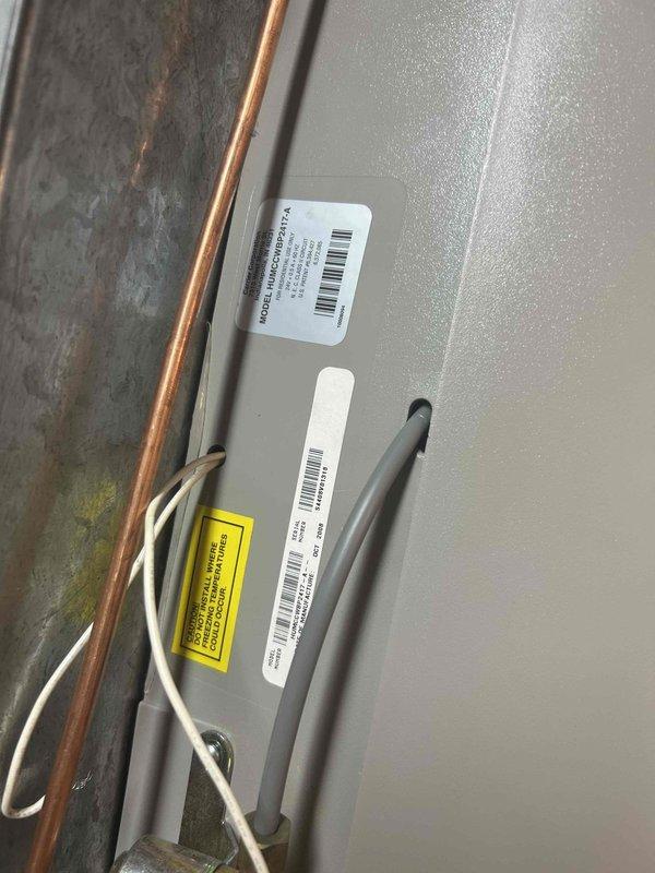 Performed routine maintenance on dual HVAC system with heat pump/air handler and AC/gas furnace units located in basement and attic (accessed via pull-down ladder). Conducted electrical testing with Fluke 376 FC True RMS Clamp Meter, confirming proper amperage draw of 1.1 Amps AC. Customer supplies 14x25x1 filters; verified equipment identification and inspected copper refrigerant lines for proper condition.