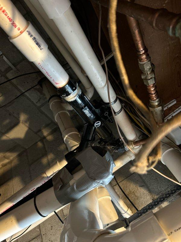 Successfully completed installation of a water-powered backup pump system in the utility area. Replaced the previous unit with a new Zoeller model, connecting it properly to the existing PVC and copper pipe network. All connections were sealed and tested to ensure proper functionality and prevent leakage.