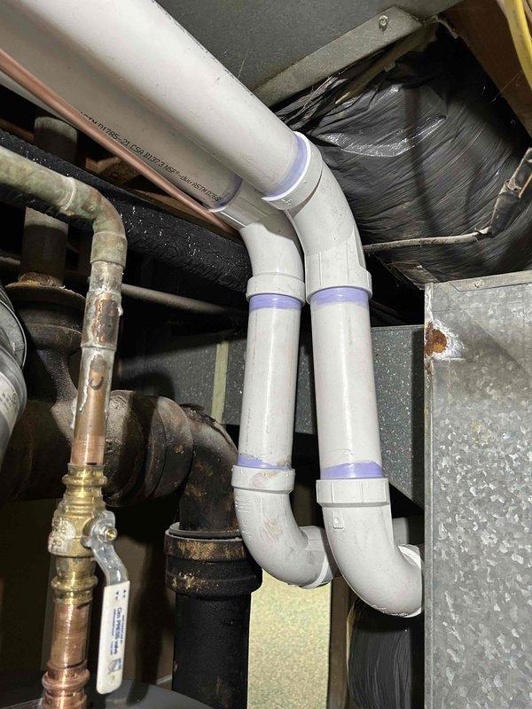 Completed installation of a Bryant HVAC system including an 80K BTU 92% efficient gas furnace, 2.5 ton 14.3 SEER2 air conditioning unit with matching evaporator coil, and digital thermostat. Installed PVC vent piping with proper connections and secured all components according to manufacturer specifications, including transition connections, standard air filter rack, electrical and gas shut-off switches, and flame roll-out protection.