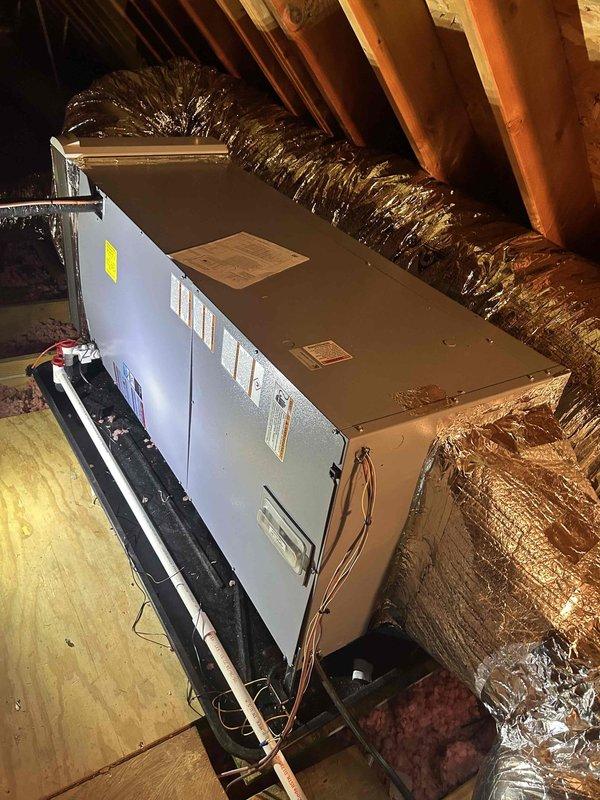 Returned to complete installation of a WaterFurnace 5 Series Split Geothermal system, including 4-ton Split Series 5 unit in basement, 4-ton Air Handler in attic with 10KW Heat Kit, Aprilaire Media Cabinet, condensate pump, digital thermostat, auxiliary safety drain pans, and flow center pumps. Verified proper system installation and refrigerant charge (44.07 lbs) with digital scale. Collected final payment upon completion.