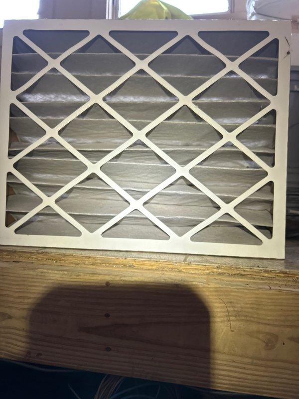 Responded to no heat complaint on 7-year-old heat pump system (installed 2019). Performed diagnostic testing with manifold gauges which revealed low refrigerant pressure affecting heating performance. Replaced dirty air filter with new standard pleated filter to improve airflow and system efficiency.