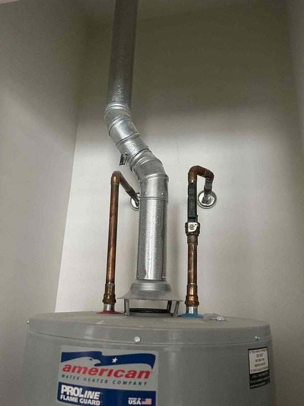 Conducted a second opinion inspection on a furnace with a reported cracked heat exchanger. Upon thorough examination of the heat exchanger and combustion chamber, no evidence of cracks or failure was found. Also noted proper installation of the water heater ventilation system with all connections secure and functioning correctly.