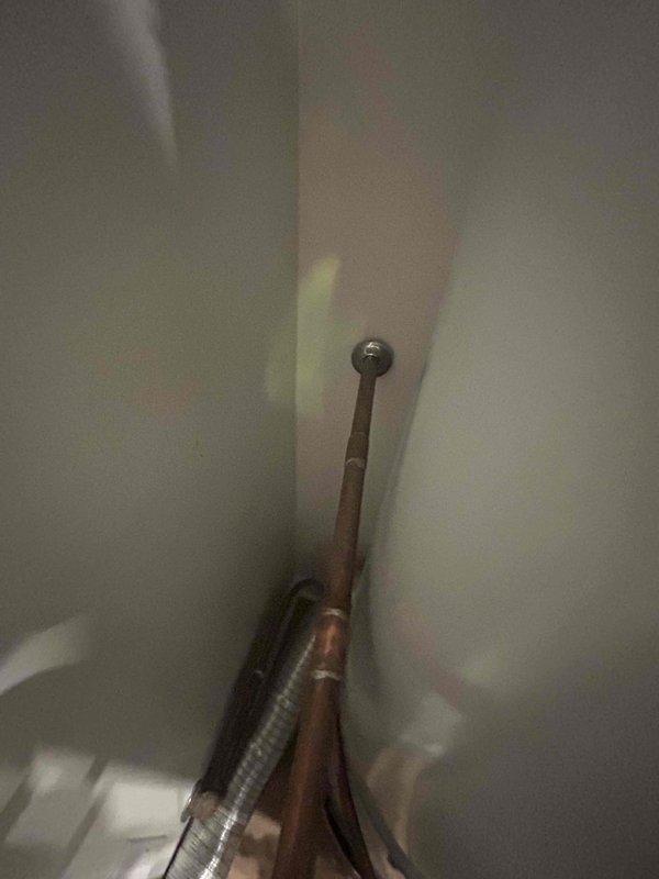 Inspected existing 50-gallon gas water heater installation and surrounding plumbing infrastructure. Provided customer with comprehensive quote for replacement unit of same specifications, scheduled for 1pm installation timeframe. Noted copper piping system in good condition with proper venting and connections intact.