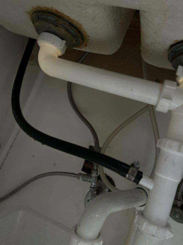 Responded to a commercial property with drain blockage affecting both an apartment and salon. Cleared sink blockage to restore proper drainage, but identified S-trap configuration requiring studor vent installation for optimal performance. Shower drain clearing was unsuccessful; scheduled follow-up visit to further diagnose the issue and coordinate with the hair salon below for comprehensive resolution.