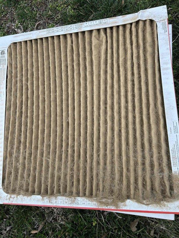 Completed replacement of reversing valve in HVAC system, added 6 pounds of refrigerant, and installed new thermostat. Removed and replaced severely soiled air filters with new ones to improve system efficiency and air quality.