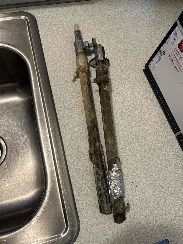 Removed corroded supply lines and shut-off valves from kitchen sink and replaced with new components. Installed new faucet assembly and verified proper water flow with no leaks. Wrapped new pipes with insulation tape to prevent future corrosion and ensure optimal performance.