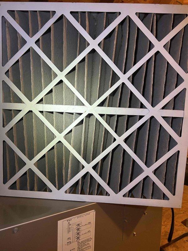 Performed diagnostic service on 10-year-old geothermal system that was not cooling. Checked system pressures with gauge set and inspected air filter, which appeared to be in good condition despite customer being unsure of last replacement date. Identified and resolved cooling issue in attic-located indoor unit.