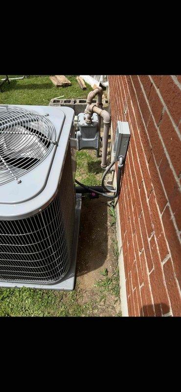 Completed routine maintenance and tune-up on newly installed Carrier HVAC system. Performed filter change and documented system condition with photos of both indoor and outdoor units as requested. Verified proper installation of air handler in basement with condensate pump and outdoor AC unit mounted on concrete pad with appropriate PVC connections.