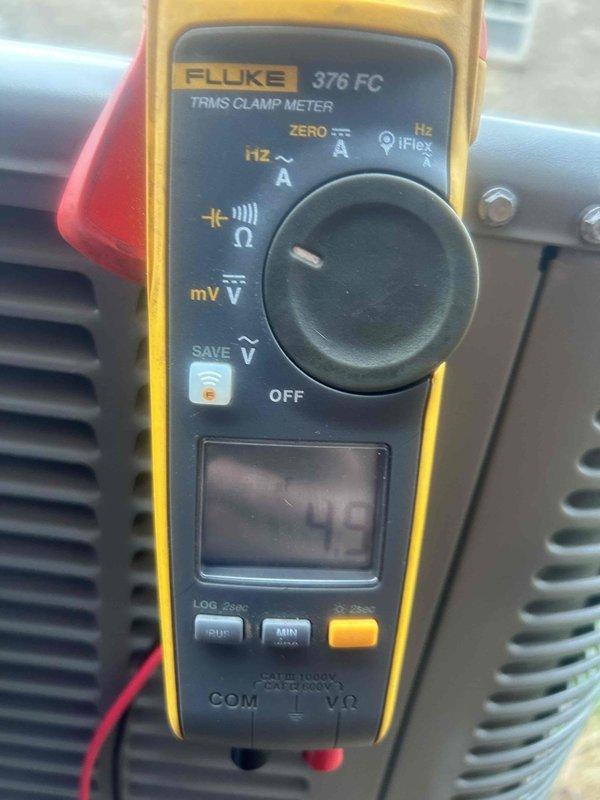 Performed Gold Level prepaid maintenance service on dual heat pump system. Tested electrical components using Fluke 376 FC clamp meter with readings at 4.9 amps, and inspected copper line connections at both air handlers for proper installation and condition. All systems functioning within normal parameters.