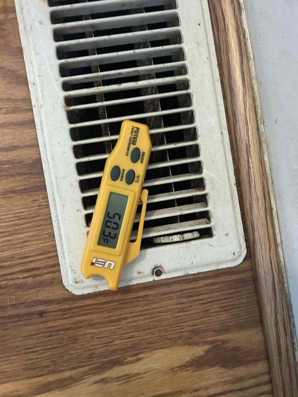 Responded to a no-cooling call for a 5-year-old heat pump system where the indoor blower was operational but the outdoor unit was non-functional. Diagnostic testing revealed indoor temperature at 23.5°C (74.3°F) with the thermostat set to 68°F. Verified Honeywell ProSeries thermostat was properly functioning in cooling mode with "Fan Auto" setting engaged.