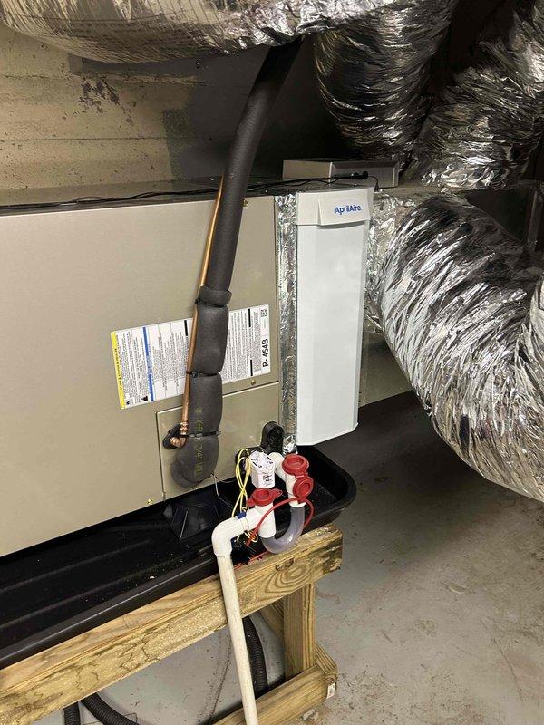 Successfully installed a complete Carrier Performance Series HVAC system, including an 18 SEER2 two-stage 3-ton heat pump (27TPA836A003), matching air handler (FT5ANXC36L00), and 15kW heat kit (AFAEHL15B01A). System was properly mounted with all required components including digital thermostat, condensate management system, and AprilAire accessory. All ductwork was properly connected and insulated according to manufacturer specifications.