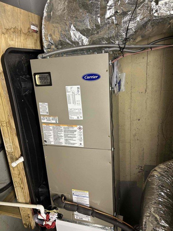 Successfully installed a complete Carrier Performance Series HVAC system, including an 18 SEER2 two-stage 3-ton heat pump (27TPA836A003), matching air handler (FT5ANXC36L00), and 15kW heat kit (AFAEHL15B01A). System was properly mounted with all required components including digital thermostat, condensate management system, and AprilAire accessory. All ductwork was properly connected and insulated according to manufacturer specifications.