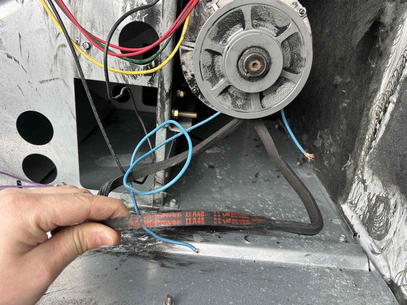 Responded to non-urgent service call for burnt belt odor in rooftop HVAC unit. Accessed unit through interior roof hatch, inspected mechanical components and identified worn drive belt showing signs of slippage and deterioration. Replaced damaged belt and verified proper tension, resolving the odor issue and restoring normal operation.