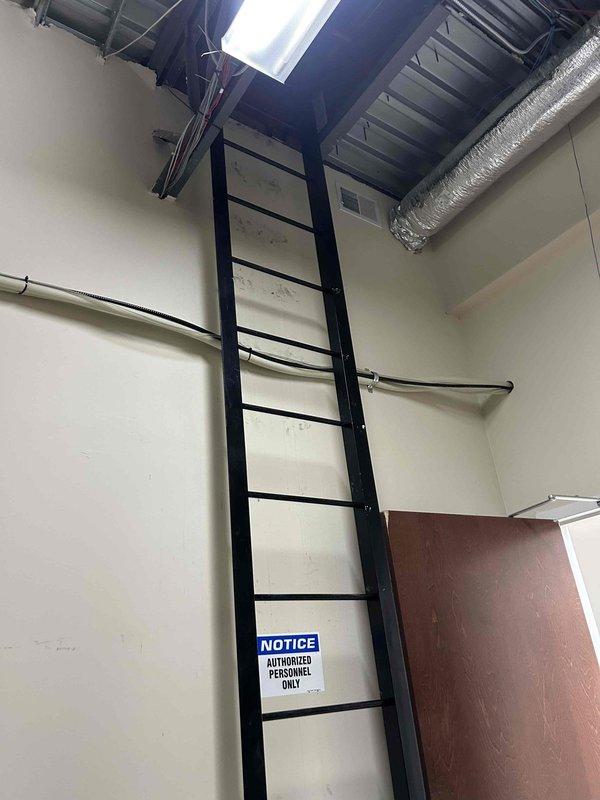 Responded to non-urgent service call for burnt belt odor in rooftop HVAC unit. Accessed unit through interior roof hatch, inspected mechanical components and identified worn drive belt showing signs of slippage and deterioration. Replaced damaged belt and verified proper tension, resolving the odor issue and restoring normal operation.